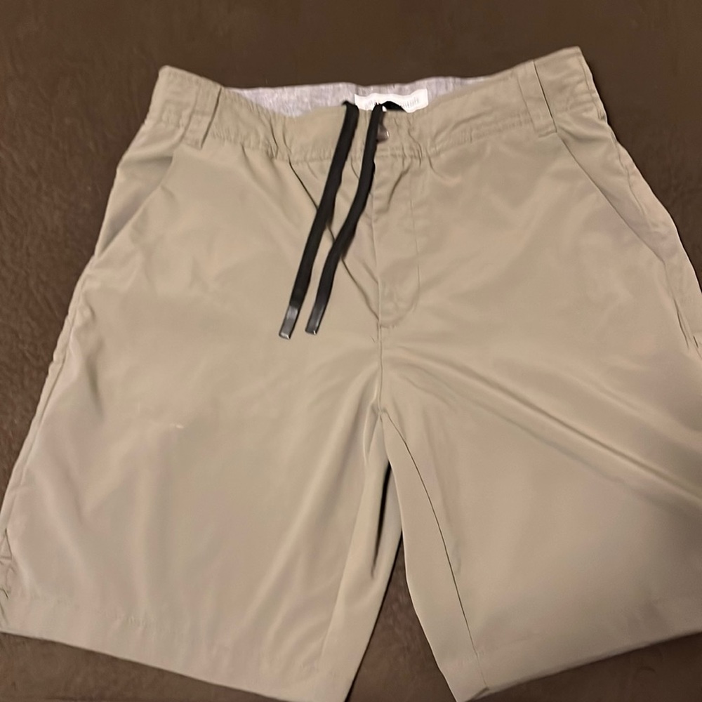 Amazon essentials shorts size 32 waist, olive green.